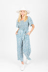 m styThe Alicia Square Neck Jumpsuit in Blue Floral, studio shoot; front view